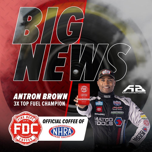 Antron Brown holding a bag of Fire Department Coffee's Original Medium Roast with text the reads ”Big news, Antron Brown 3X top fuel champion, Fire Department Coffee Official Coffee of the NHRA