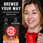 A promotional graphic for a pod coffee maker showing a smiling woman on the right holding a red mug, alongside product text and a branded coffee pod package on the left. The text reads ’BREWED YOUR WAY’ and includes ’Load, press start, and serve.