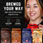 Fire Department Coffee Spirit Infused Coffee bundle beside a smiling woman holding a red mug. Brewing guide recommends 2 tablespoons of coffee per 6 ounces of filtered water, adjusted to taste and enjoyed hot or iced. Four flavors shown: Mexican Chocolate Tequila, Butter Toffee Bourbon, Blueberry Crumble Bourbon, and Toasted Marshmallow Whiskey.