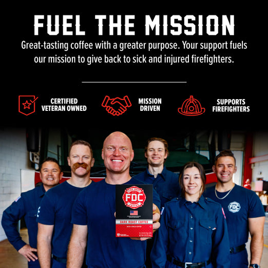 A group of firefighters wearing navy blue PDC uniforms stand together in a garage-like setting, holding a box of FDC Fire Department Grind Coffee. The top of the image has a black banner with white text reading ’FUEL THE MISSION’ and supporting claims like ’Certified Veteran Owned,’ ’Mission Driven,’ and ’Supports Firefighters.