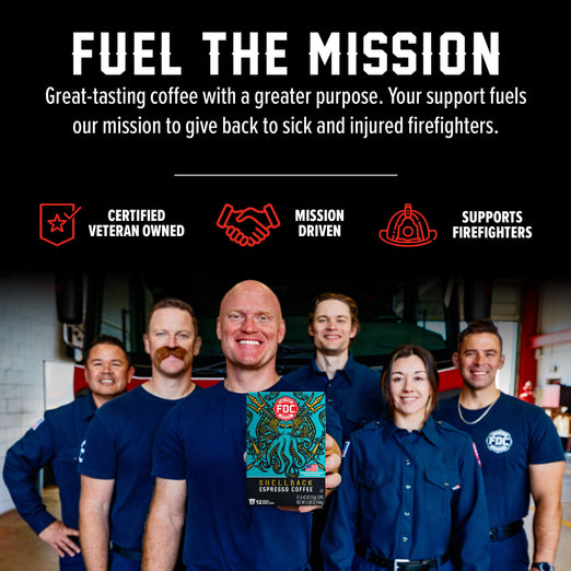 A group of smiling firefighters in navy uniforms hold a coffee bag in a garage-like setting. Above them, bold white text reads ’FUEL THE MISSION’ with supporting copy and icons for ’Certified Veteran Owned,’ ’Mission Driven,’ and ’Supports Firefighters.