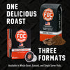 FDC Coffee Dark Roast promotional graphic showing a whole bean box, a single-serve pod, and loose coffee beans and grounds on a black textured background, with large text reading 'ONE DELICIOUS ROAST' and 'THREE FORMATS'.
