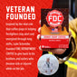 A hand holds a box of FDC Donut Shop Coffee against a red promotional background with white text about a veteran-founded coffee brand. The box is dark brown with a red circular FDC logo and an orange donut graphic.