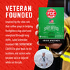 A hand holds a green and black box of FOC Fire Department Irish Whiskey coffee against a red promotional background with white text about veteran funding for firefighters. A small circular photo of a man in a sailor uniform appears at the bottom.