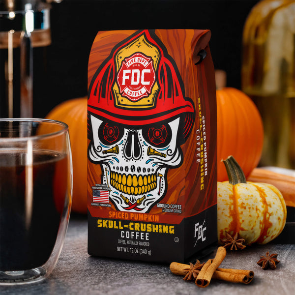 A 12oz bag of the limited edition Spiced Pumpkin Skull Crushing Ground Coffee on a white background.