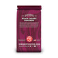 Purple coffee bag labeled ’Black Cherry Bourbon’ with branding on a white background