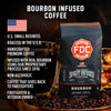 A bag of Bourbon Infused Coffee with bullet points that read "U.S small business, roasted in the U.S.A, handcrafted premium coffee, infused with real bourbon using our proprietary process since 2016, non-alcoholic, coffee that gives back to firefighters, firefighter and veteran owned".