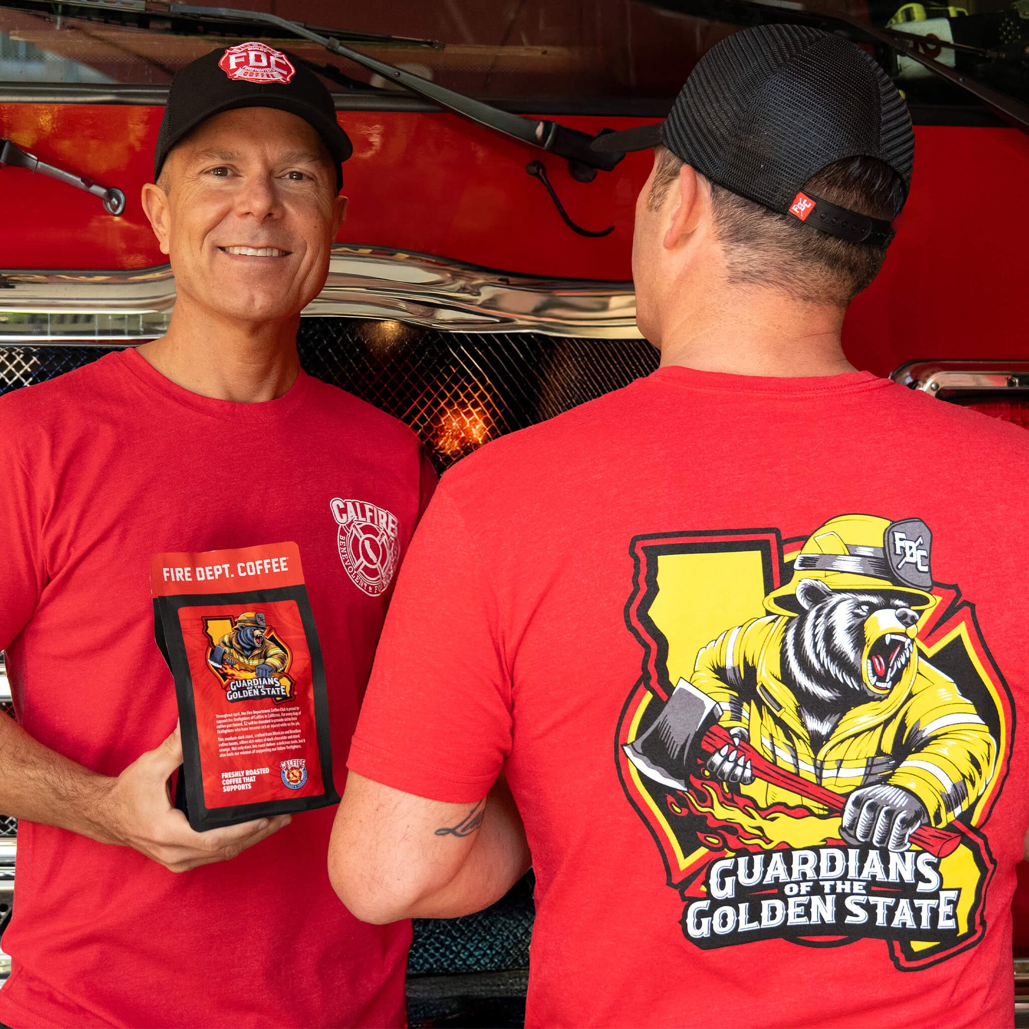 Fire Department Coffee's 'Guardians of the Golden State' coffee bag and red T-shirt featuring a firefighter bear design.