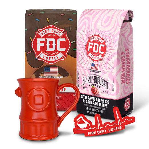 The Coffee Lovers Valentine’s Day Bundle, containing a bag of Donut Shop Coffee, a bag of Strawberries and Cream Rum Infused Coffee, a red EKG Sticker, and a red Fire Hydrant mug.