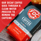 A bag of Decaf Coffee with text that reads ”Our Decaf Coffee goes through a clean water process to remove the caffeine.”