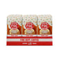 front view of twelve 12 oz bags of Vanilla Sprinkle Donut Shop Coffee in open display box