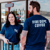 Two people wearing the Crew T Shirt, one facing forward and one facing backward.