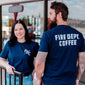 Two people wearing the Crew T Shirt, one facing forward and one facing backward.
