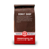 The back of a 12-ounce package of Fire Department Coffee's Donut Shop Coffee bag on a white background.