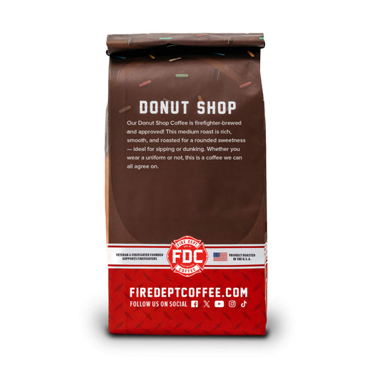The back of a 12-ounce package of Fire Department Coffee’s Donut Shop Coffee on a white background.