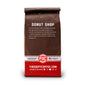 The back of a 12-ounce package of Fire Department Coffee’s Donut Shop Coffee on a white background.