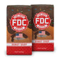 2 12-ounce packages of Fire Department Coffee’s Donut Shop Coffee Roast on a white background.