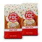 A pair of Fire Dept. Coffee 12 ounce Vanilla Sprinkle Donut Shop Coffee packages.