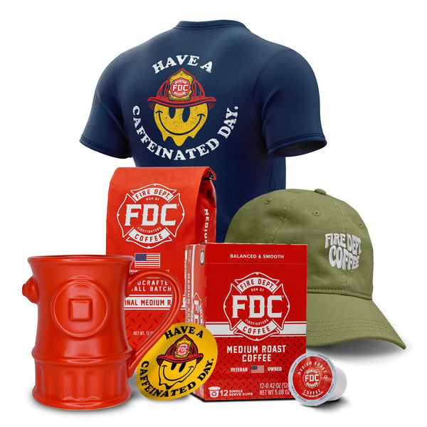 A collection of products in the Groovy Bundle including the Navy Blue Have a Caffeinated Day shirt, Green dad hat, Medium Roast Coffee, a red fire hydrant coffee mug, and a yellow Have a Caffeinated Day sticker.