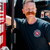Firefighter Fenton wearing the Always on Call Shirt