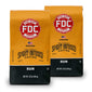 A pair of Fire Dept. Coffee 12 ounce Rum Infused Coffee packages.
