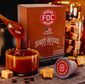 Fire Department Coffee’s Salted Caramel Bourbon Infused Coffee pods packaging with a single coffee pod in front on a dark background.