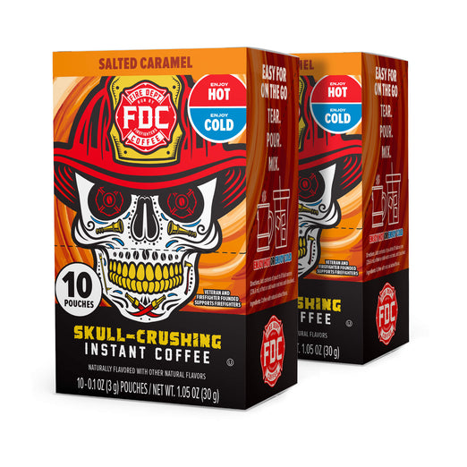 Two boxes of FDC Skull-Crushing Instant Coffee with a skull design on the packaging.