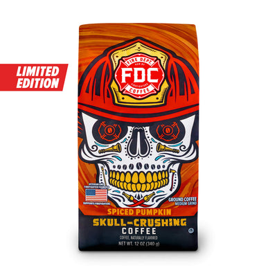 A 12oz bag of the limited edition Spiced Pumpkin Skull Crushing Ground Coffee on a white background.