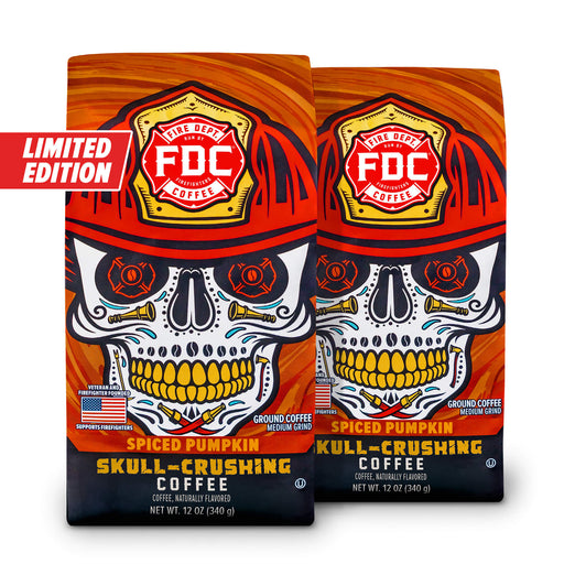 Two, 12oz bags of the limited edition Spiced Pumpkin Skull Crushing Ground Coffee on a white background.