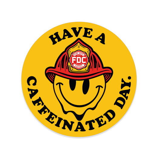 A circular yellow design with a melting smiley face with a fire helmet at the center. Black text reads HAVE A CAFFEINATED DAY.