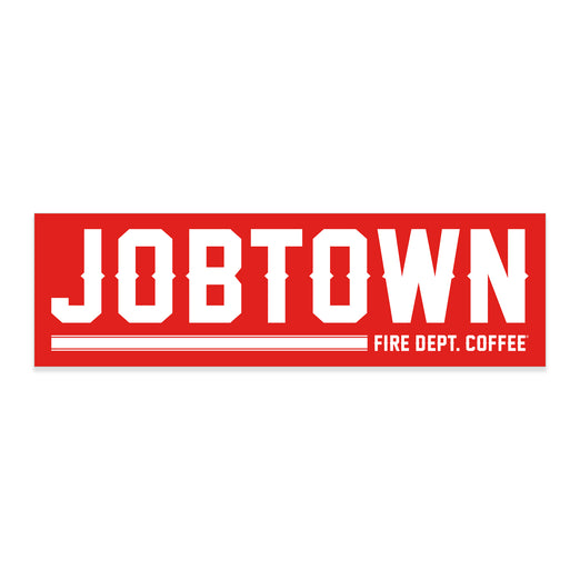 A red sticker with white letting that reads JOBTOWN FIRE DEPT. COFFEE