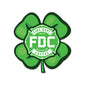 A green shamrock design with a green FDC maltese cross logo at its center