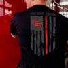 A lifestyle image of someone wearing the Thin Red Line Shirt. The back of the shirt features the thin red line flag with the FDC pike pole logo and text that reads "Fire Dept. Coffee"