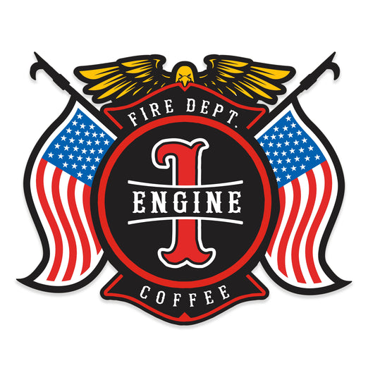 A maltese cross design with American flags on each side, a golden eagle on top and text that reads ”Engine 1” in the center.