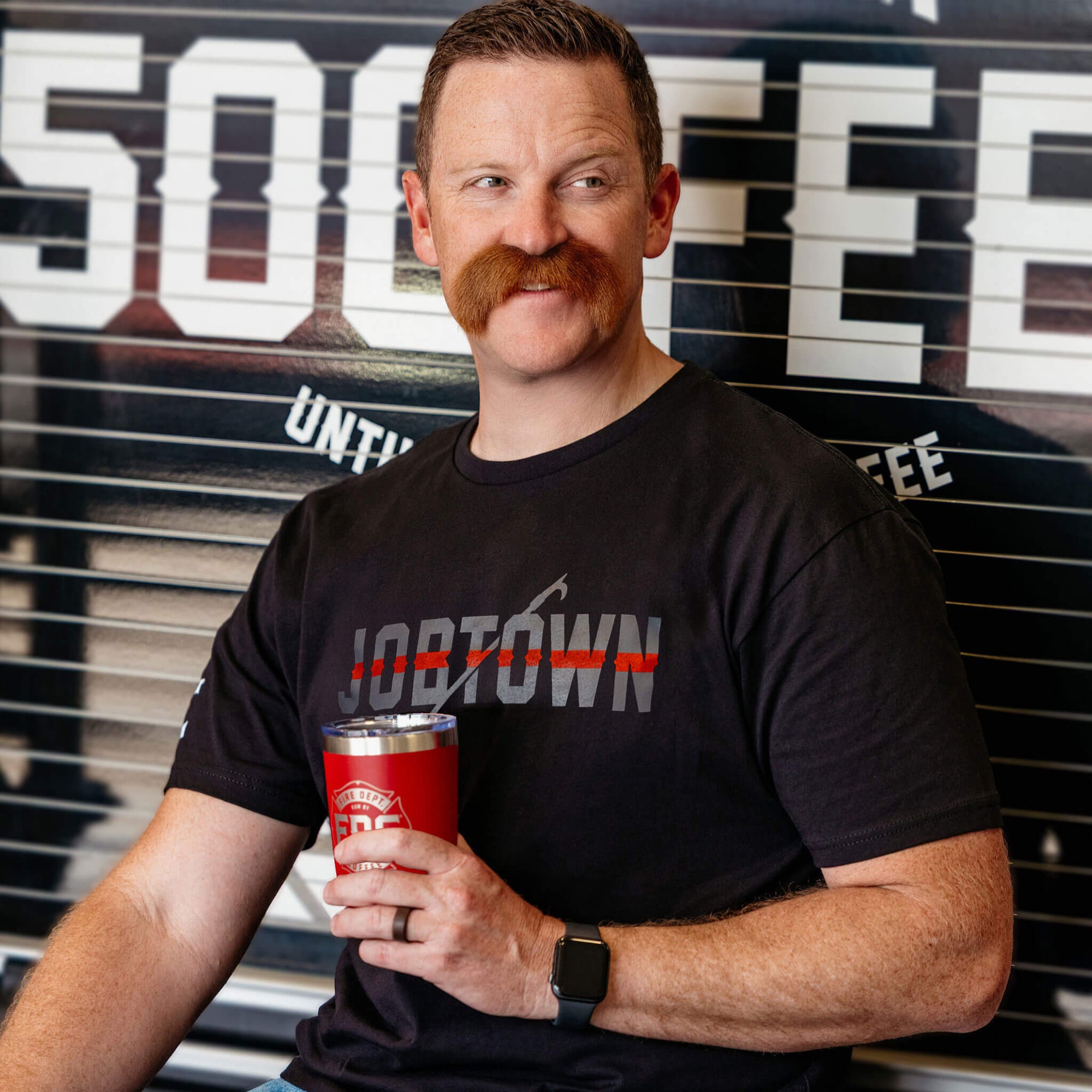 The Jobtown Thin Red Line Black Shirt with a pike pole design.