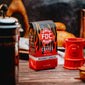 A bag of Backdraft Espresso sitting on a table next to a Fire Hydrant Mug 