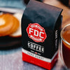 A bag of Dark Roast Coffee on a table