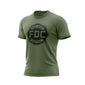 A military green Fire Dept. Coffee T-shirt displayed on a white background, featuring a large black FDC Maltese cross logo on the front
