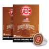 Three boxes of FDC Fire Department Spirit-Infused Coffee in Salted Caramel Bourbon flavor, with one coffee capsule in front on a white background.