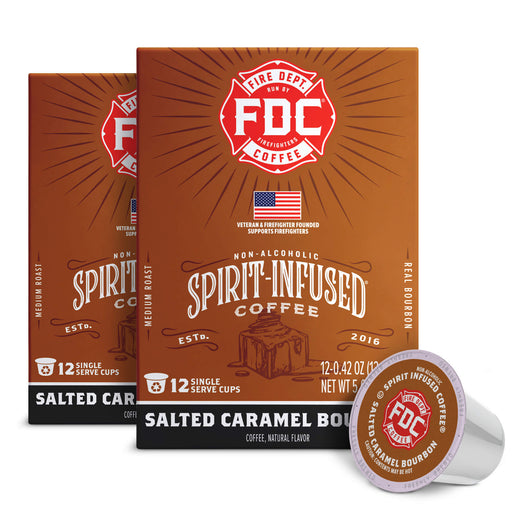 Three boxes of FDC Fire Department Spirit-Infused Coffee in Salted Caramel Bourbon flavor, with one coffee capsule in front on a white background.
