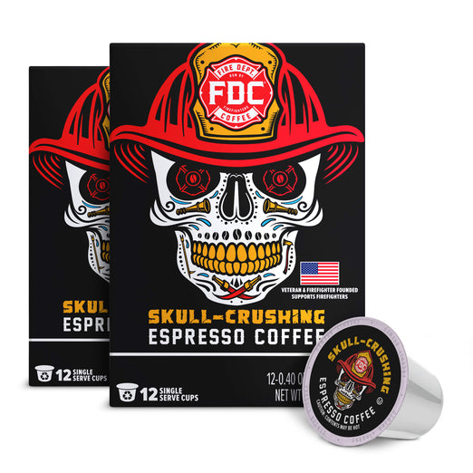 Three black boxes of FDC Skull-Crushing Espresso Coffee with a single coffee capsule shown in front, all featuring a skull wearing a red firefighter helmet on a white background.