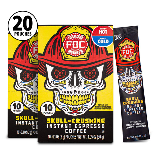 Three packages of FDC Skull-Crushing Instant Espresso Coffee shown on a plain white background: a large yellow-and-black 10-pouch box in the center, a single black coffee pouch to the right, and a white circular badge reading 20 pouches at upper left.
