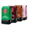 Four Spirit Infused Coffee bags from FDC Coffee on a white background