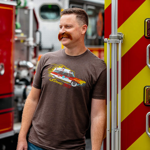 Firefighter Fenton wearing the Meat Wagon Shirt.