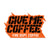 Orange sticker with black lettering that says "Give me coffee" in all caps and "Fire Dept. Coffee" in white below