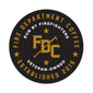 Fire Dept. Coffee seal in gold and black with a gold FDC pike pole logo in the center. Text around reads Fire Department Coffee, run by firefighters, veteran owned, established 2016