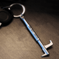A New York Hook Keychain Bottle opener shown on a keychain.