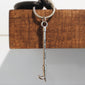 Pike Pole Keychain hanging off of a desk